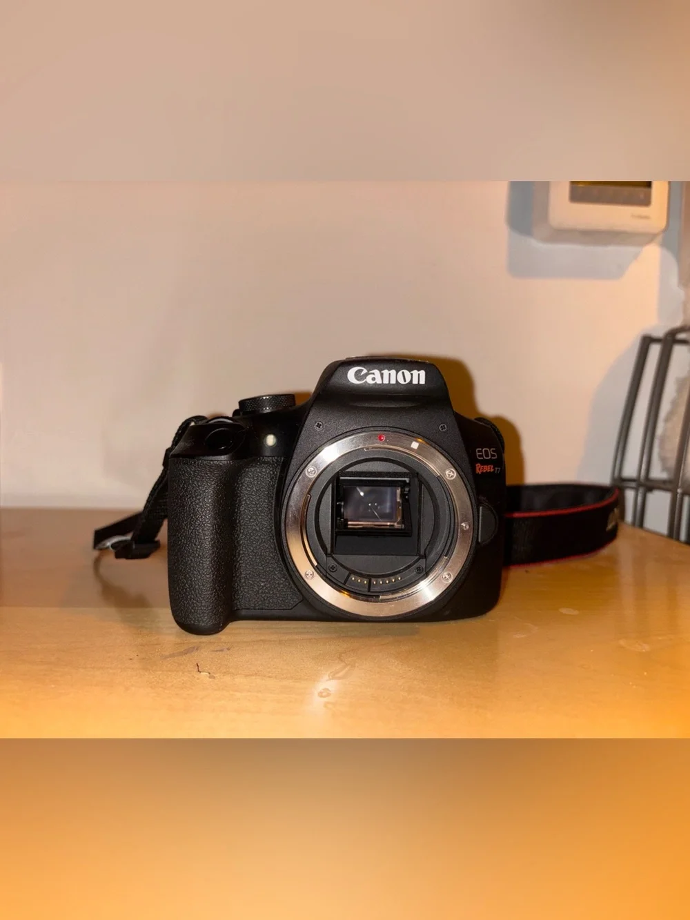 Canon EOS Rebel T7 DSLR Camera with 18-55mm Lens with Charger (Black)